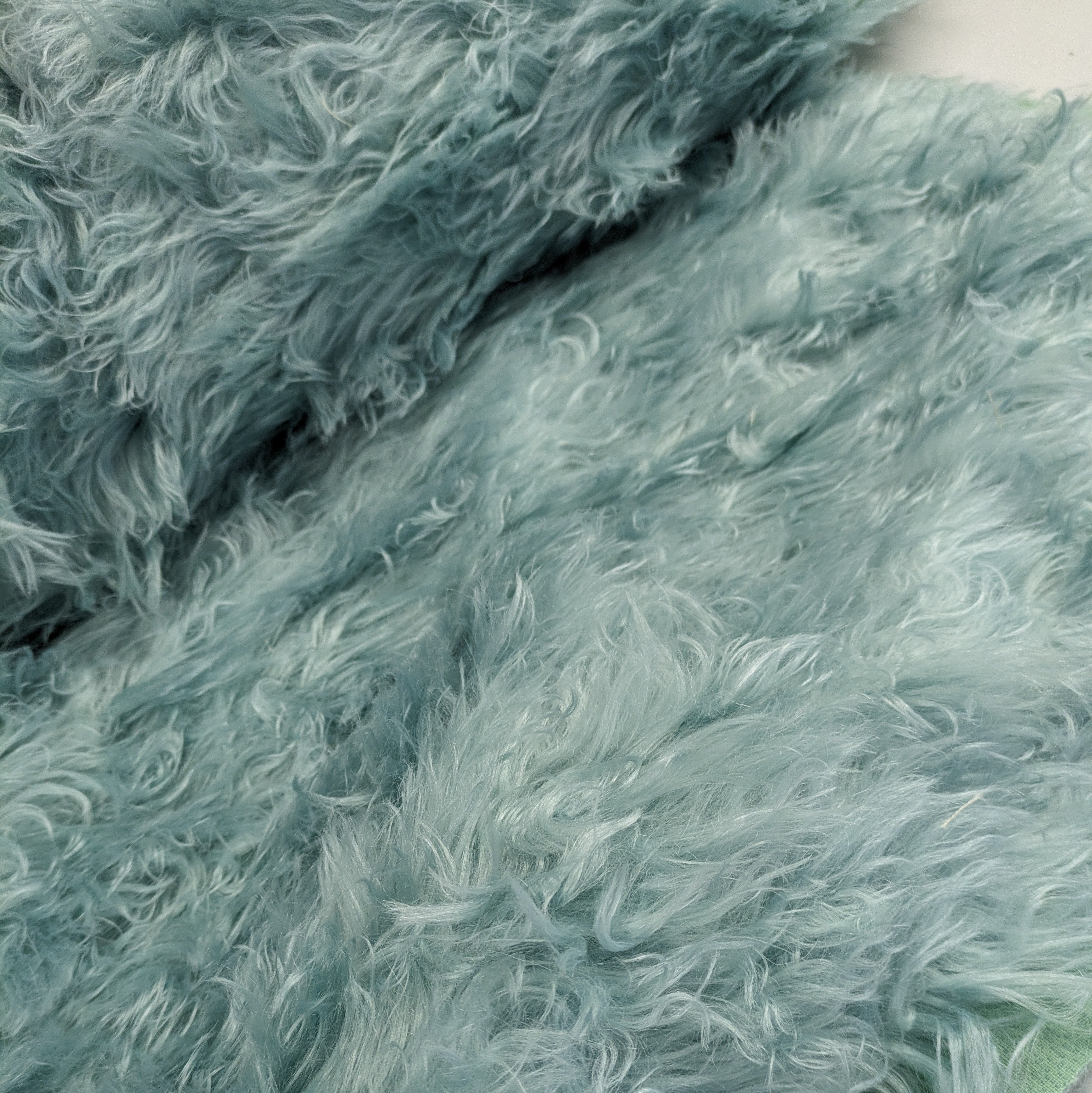Mint green faux fur
