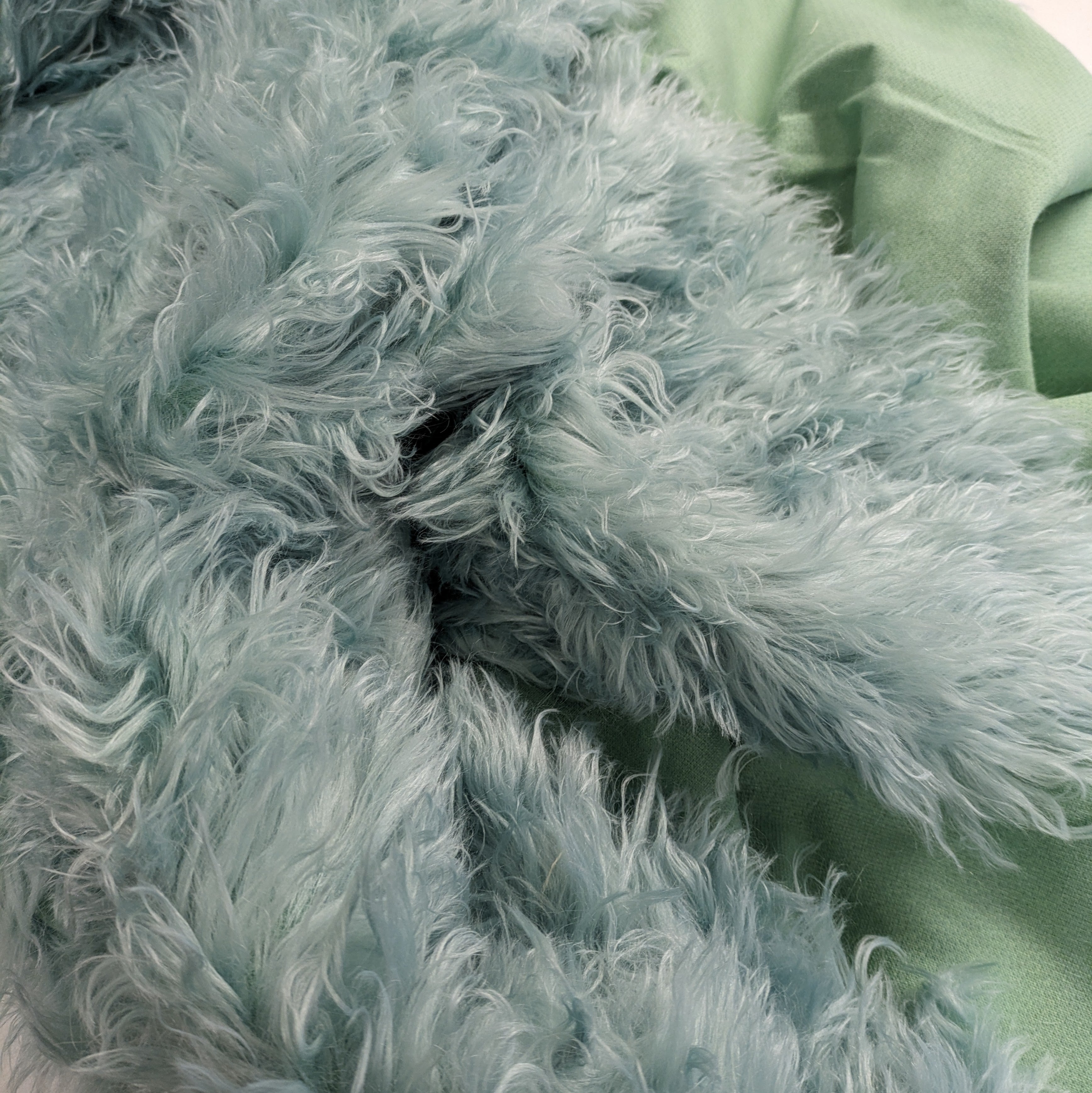 Mint green faux fur