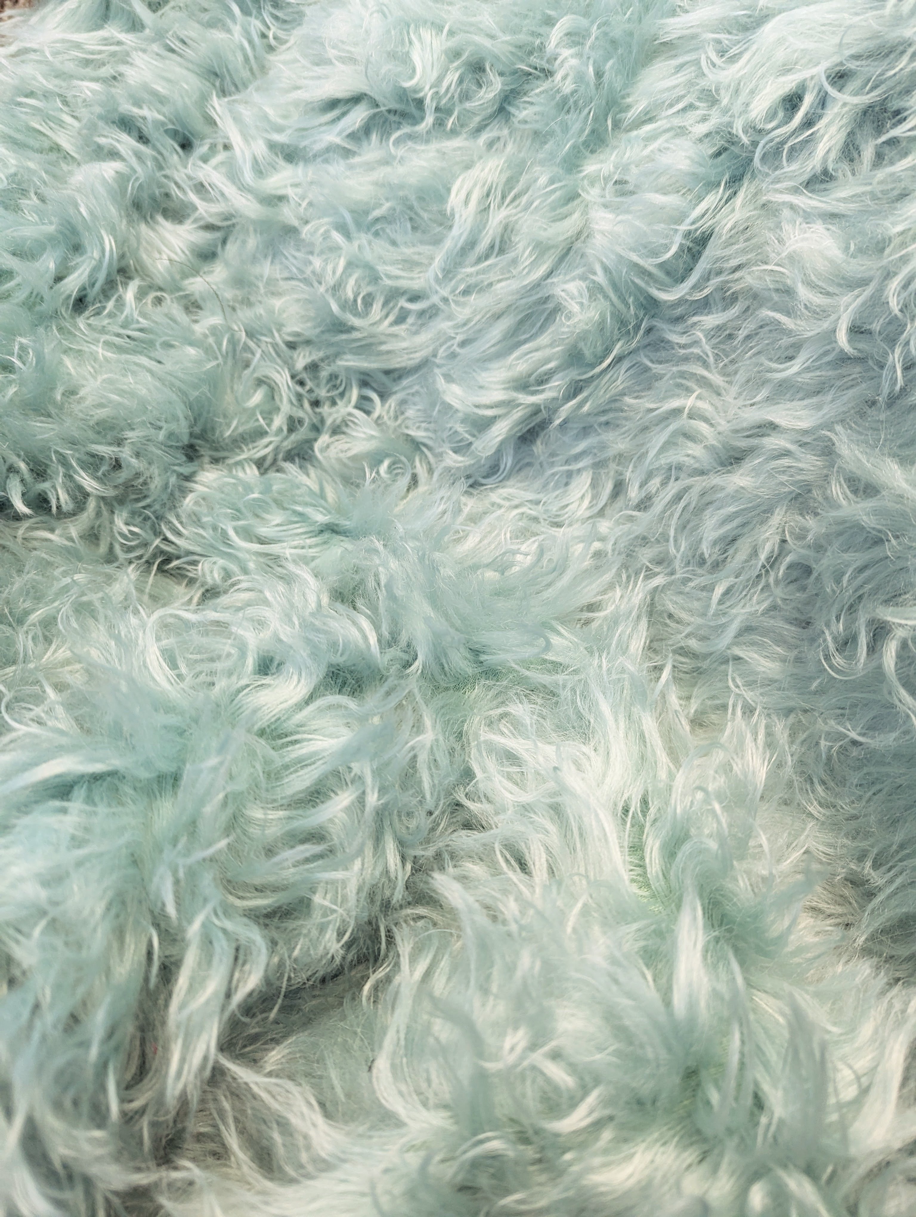 Mint green faux fur