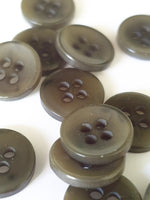 Dark green horn buttons