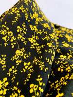 Viskose Stoff mit Blumenmuster schwarz gelb