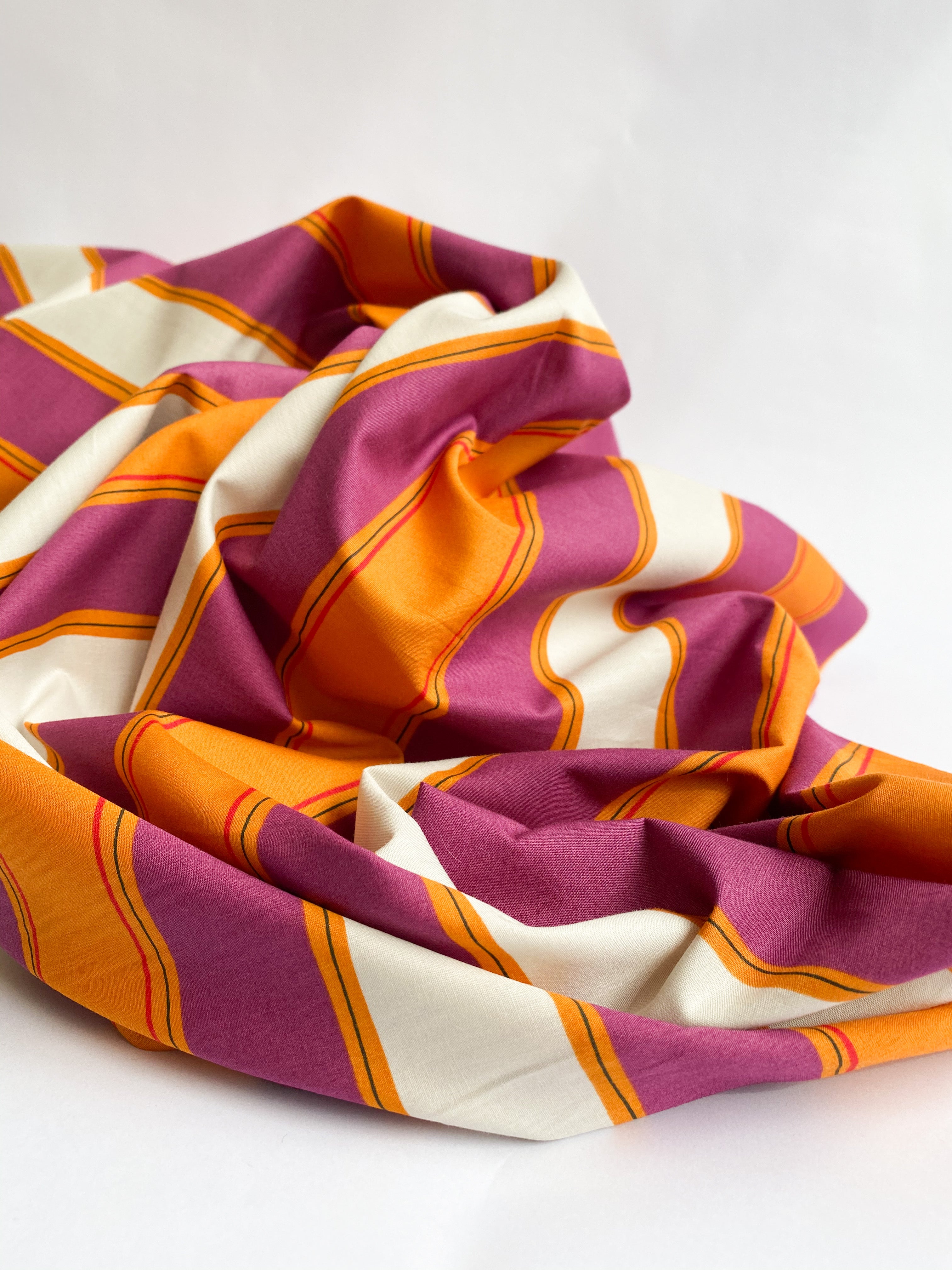 Baumwoll Stoff mit Streifen in lila und orange