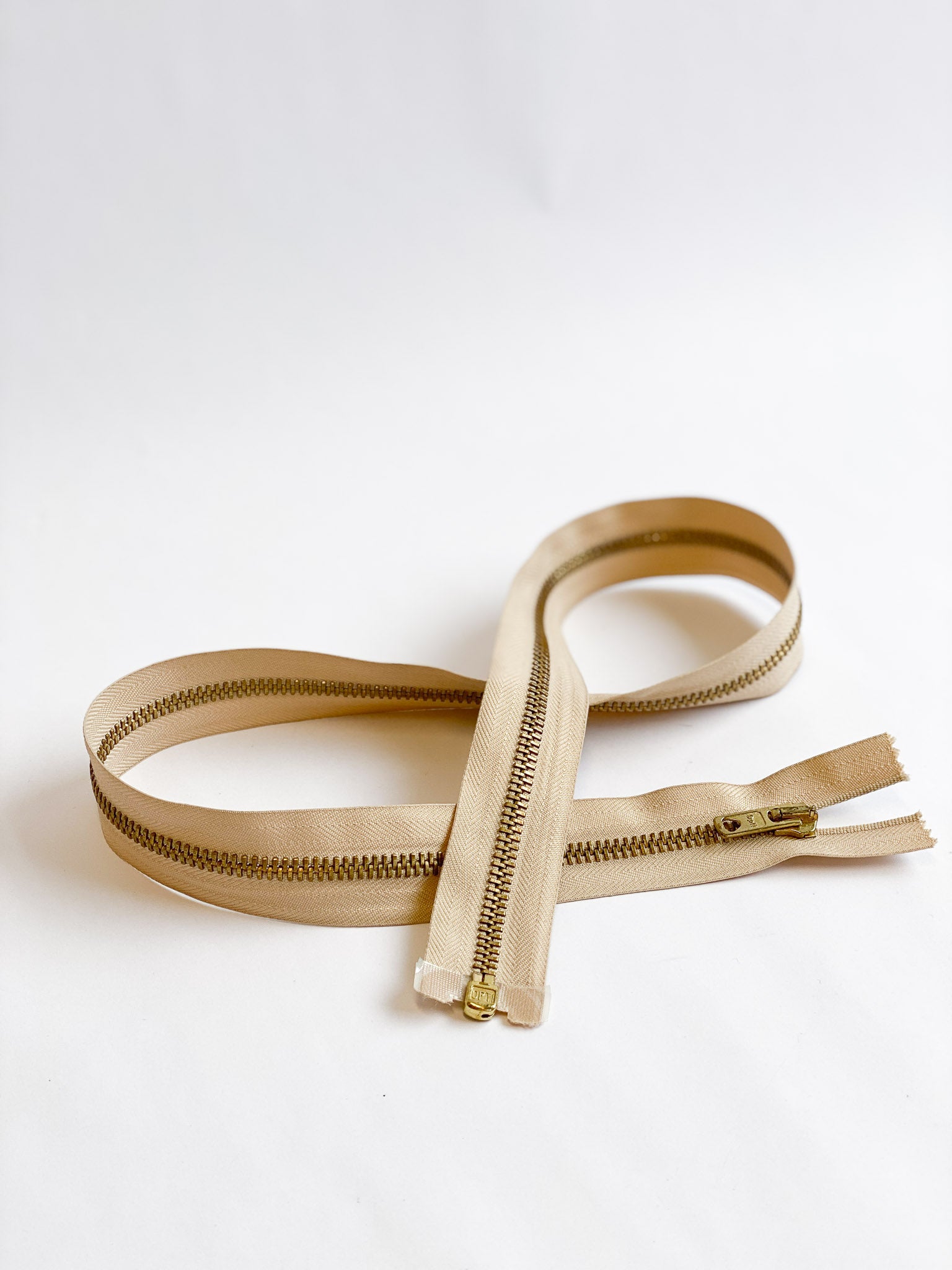 Jacket zipper metal divisible 75 cm gold beige